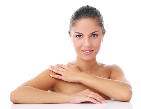 Portrait of a beautiful woman who is posing over a white background