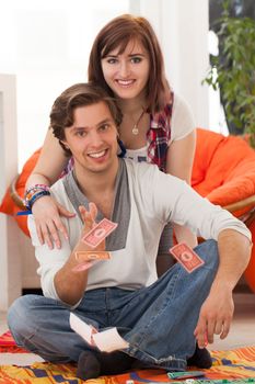 Young beautiful caucasian couple at home