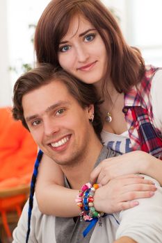 Young beautiful caucasian couple at home