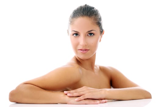 Portrait of a beautiful woman who is posing happily and tenderly over a white background