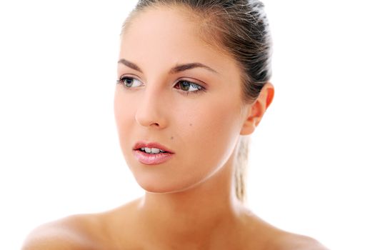 Portrait of a beautiful woman who is posing happily and tenderly over a white background