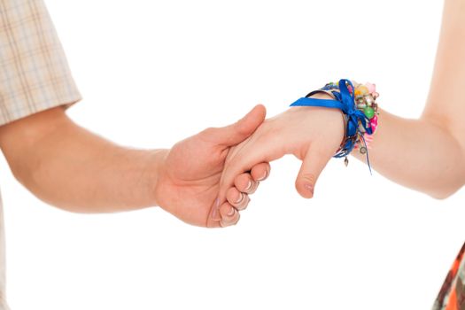 Hands together of romantic caucasian couple over white background