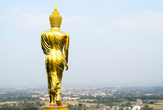 The Golden Standing Buddha Image.