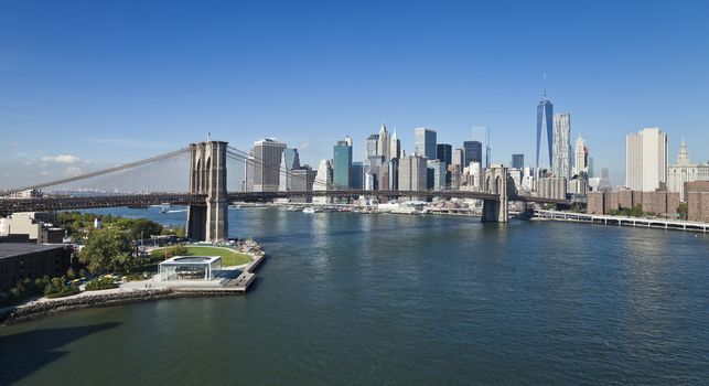 The New York City Downtown w Brooklyn Bridge and Freedom tower