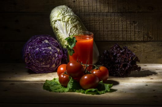 still life with tomato juice, tomatoes and vegetables