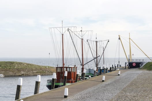 fishing boat in harbor ouddorp, a village in the netherlands