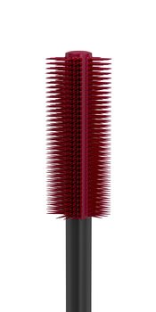 Close-up of mascara brush on white background