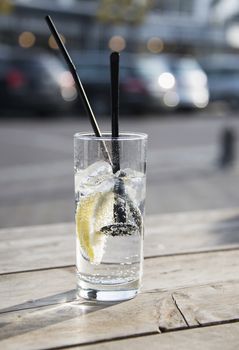 glass of drinks with bubbles on terrace