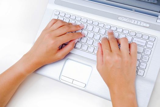 Keyboard Typing.female texting on a white laptop keyboard