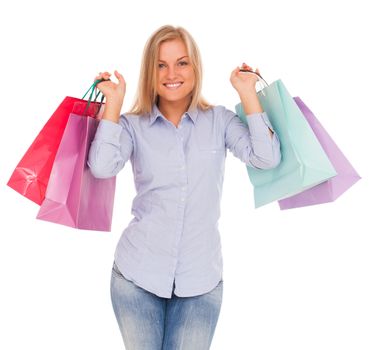 Young blond caucasian woman with shopping bags smiling over white background