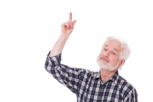 Handsome elderly man with grey beard shows on something isolated over white background