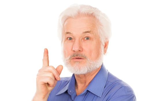 Handsome elderly man with gray beard has an idea isolated over white background