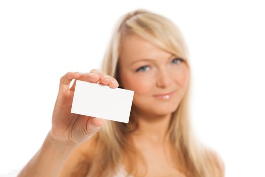 Young attractive woman with empty card isolated over white background