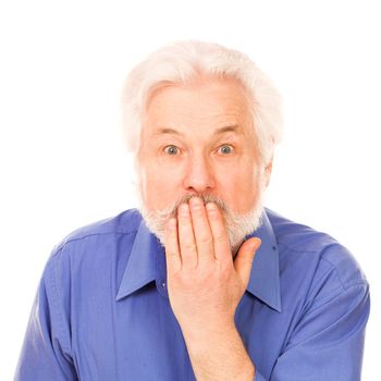 Elderly man holds hand on mouth isolated over white background