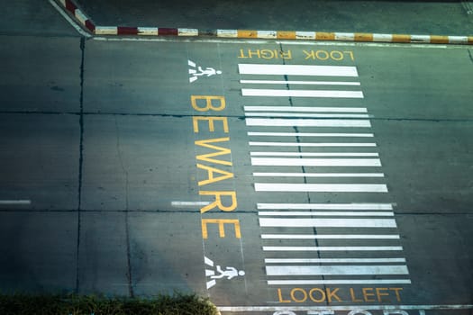 zebra crossing, on urban asphalt road for passenger or people and transportation at night time, top view