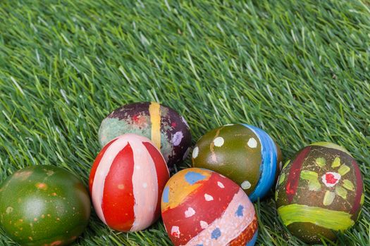 Happy easter eggs group on grass,can use as background for god festival