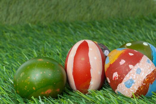 Happy easter eggs group on grass,can use as background for god festival