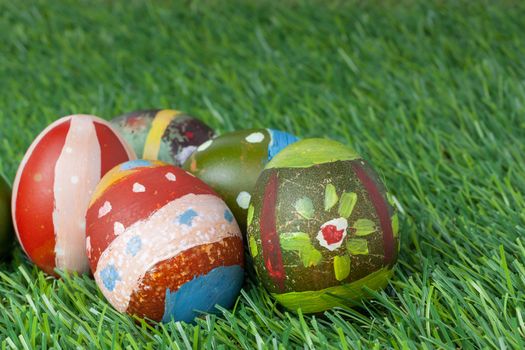 Happy easter eggs group on grass,can use as background for god festival