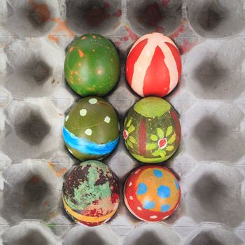 Painted easter eggs for festival event on crate
