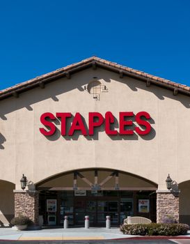 SANTA CLARITA, CA/USA - MARCH 9, 2015: Staples office supply store exterior. Staples, Inc. sells supplies, office machines, promotional products, furniture, technology, and business services 
in stores and online.
