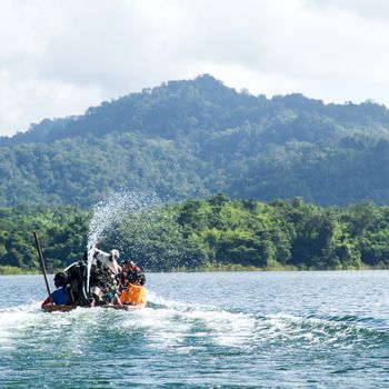 Lake mountain with boat and blue sky