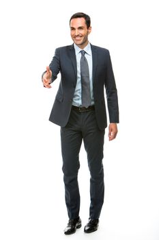 Full length portrait of a businessman smiling raising his arm for shaking hands