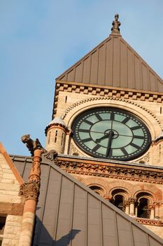 Old city hall of Toronto in gothic style under the sunset light
