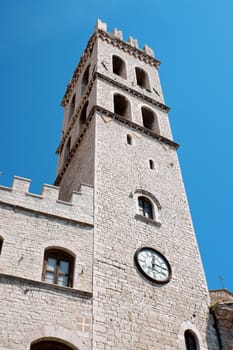 Detail of the ancient Palazzo del Capitano del Popolo, nowadays town hall and its tower in Assisi, a very well known touristic town in the italian province of Perugia (Umbria). The town was built on Mount Subasio.