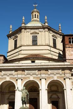 Basilica of Saint Lawrence (San Lorenzo) and the statue of Emperor Constantin in Milan. Dating from the 4th century AD, the Basilica called Chiesa di San Lorenzo Maggiore is the oldest church in Milan