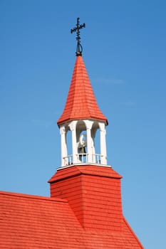 The wooden red roof of the old church of Tadoussac, also known as "Indians chapel", was built in 1747. Heritage Site of national importance since 1965, is the oldest existing log-built church in Canada.