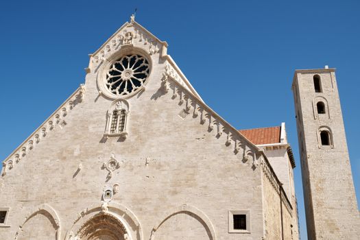 Ruvo di Puglia Cathedral in the southeast italian region of Apulia. The simple but elegant facade shows a lot of statues with vegetal, animal and human details. The Cathedral was dedicated to Santa Maria Assunta and was built between 12th and 13th century.