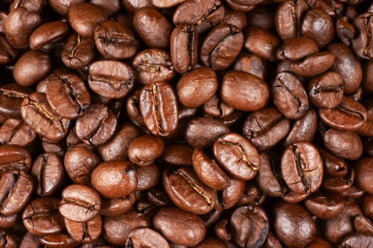 Background of roasted arabica coffee beans.