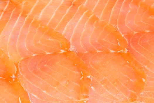 Macro of some slices of smoked salmon. Perfect as organic background.