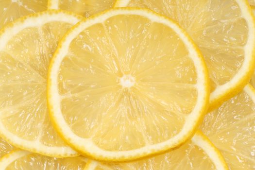 Close-up of slices of fresh lemon for an organic background.