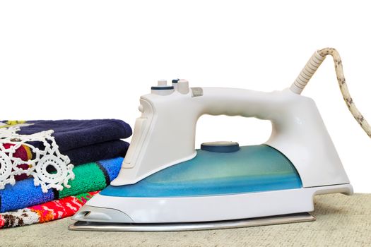 Convenient electric iron on the Ironing Board. Presented on a white background.