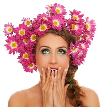 Beautiful young caucasian woman with flowers in hair isolated over white background