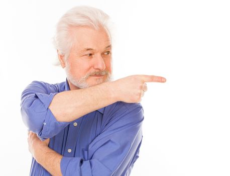 Handsome elderly man with gray beard shows on something isolated over white background