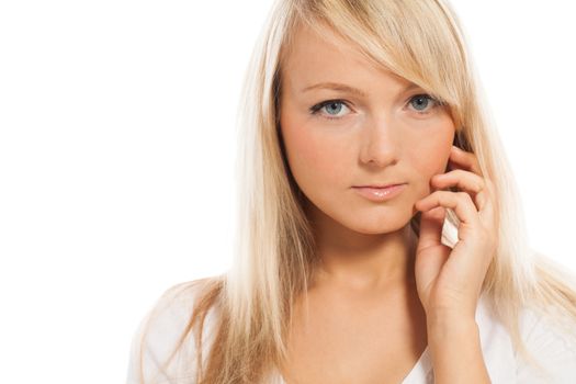 Young attractive woman posing isolated over white background