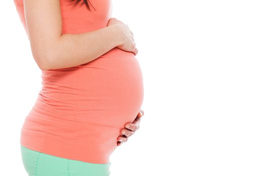 Beautiful pregnant belly on a white background