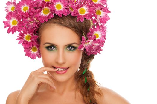 Beautiful young caucasian woman with flowers in hairover white background