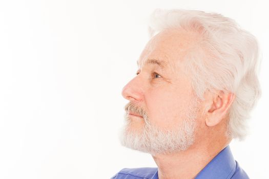 Handsome elderly man with gray beard isolated over white background