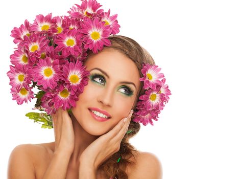 Beautiful young caucasian woman with flowers in hairover white background