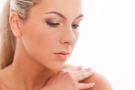 Closeup portrait of beautiful caucasian woman with day makeup