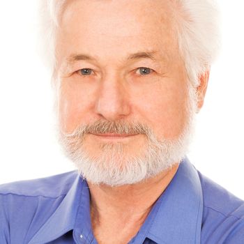 Portrait of handsome elderly man with beard on a white background