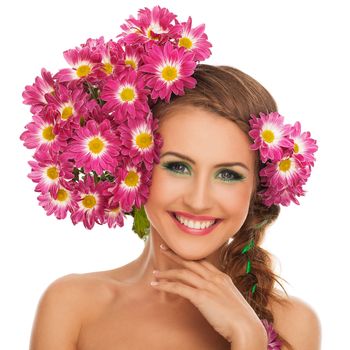 Beautiful young caucasian woman with flowers in hair isolated over white background