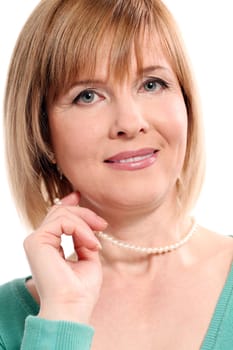 Beautiful middleaged woman with short hair on a white background