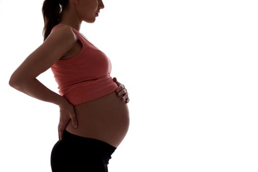 Beautiful pregnant woman isolated over white background