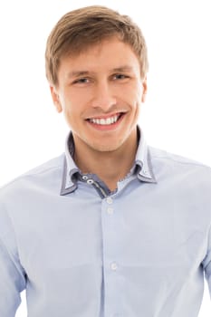 Handsome man in a blue shirt smiling over a white background