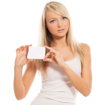 Young attractive woman with empty card isolated over white background