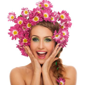 Beautiful young caucasian woman with flowers in hair isolated over white background